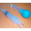 DISPOSABLE IRRIGATION SYRINGE